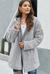 Manteau en peluche à capuche